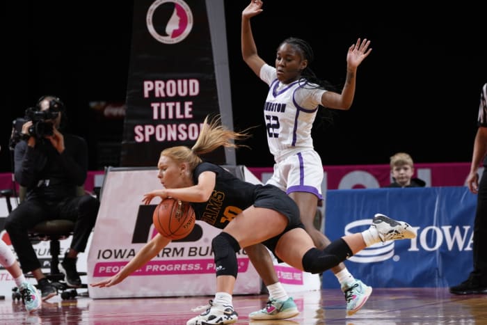 Southeast Polk's Alyssa Bartlett (with ball) and Johnston's Aaliyah Riley (Photo by Matthew Putney)